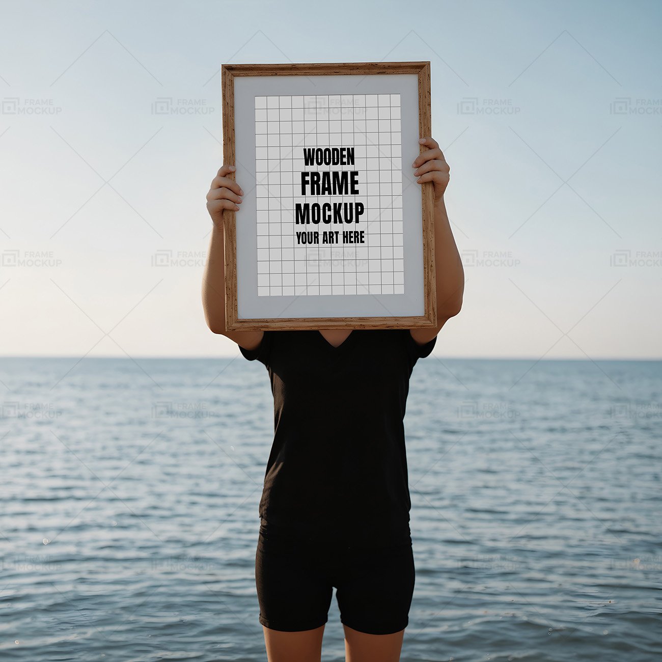 Showcase Your Art with Wooden Frame Mockup at the Beach