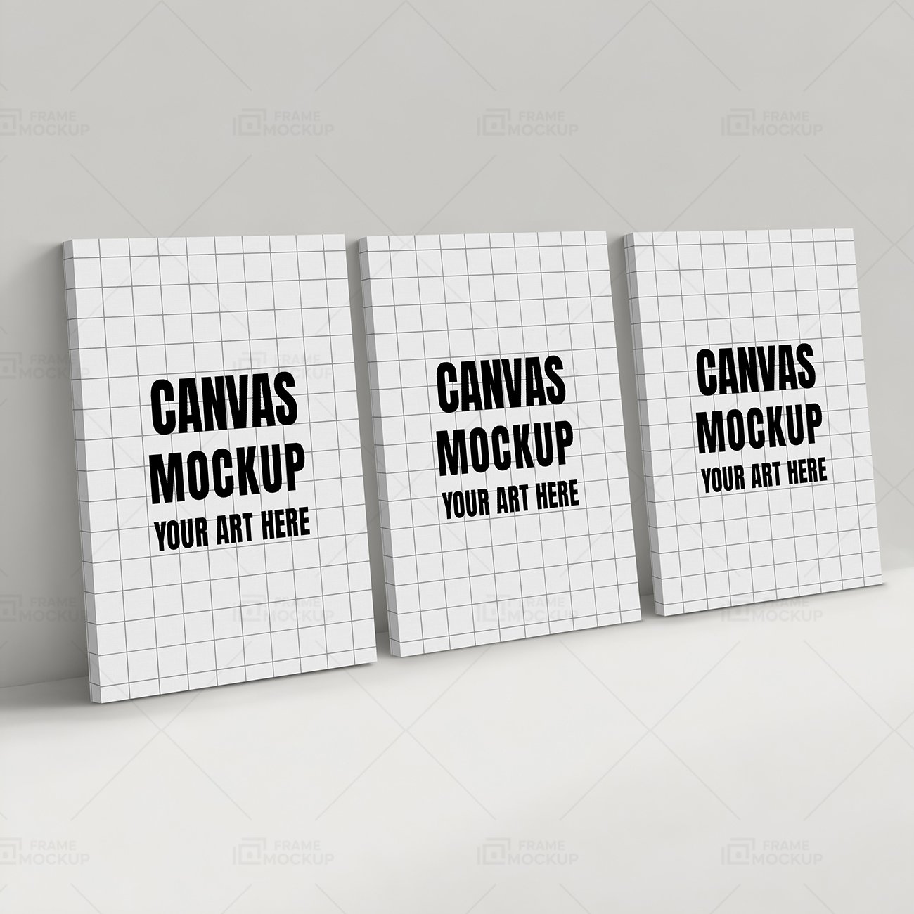 Three blank canvas mockups positioned against a light wall, featuring grid patterns and bold text for artwork display.